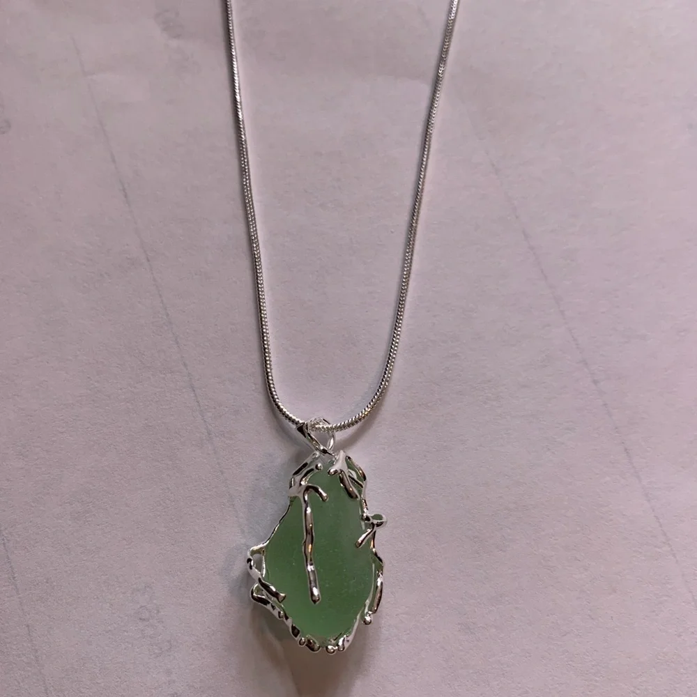 Genuine Caribbean Sea Glass Wrapped in Nature-Inspired Silver Plated Cage